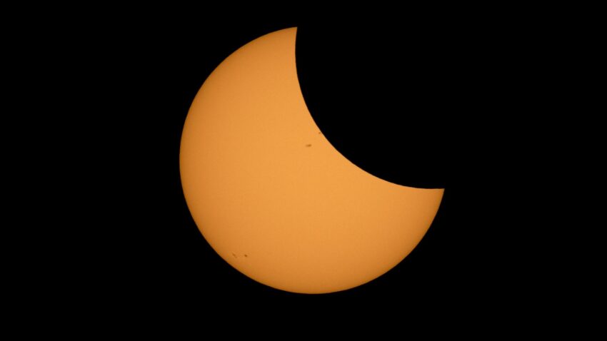 The Moon is seen passing in front of the Sun during a solar eclipse from Ross Lake, Northern Cascades National Park, Washington on Monday, Aug. 21, 2017.